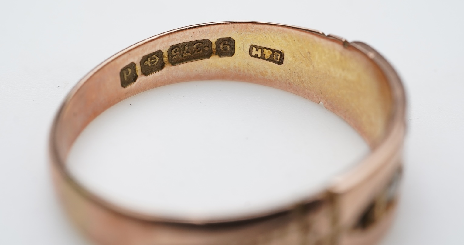 A collection of four gold rings